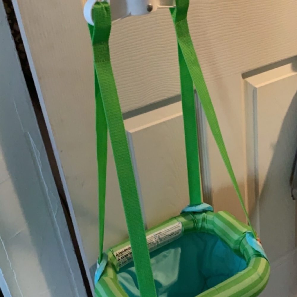 Baby swing, diapers, pacifiers, and wipes